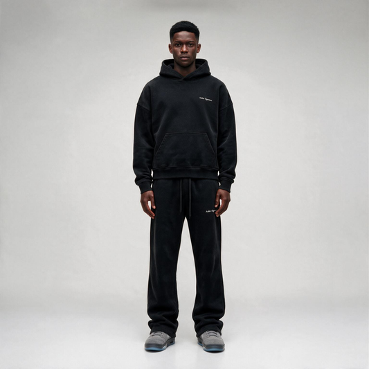 Black hoodie featuring a matching white "SIGNATURE"
