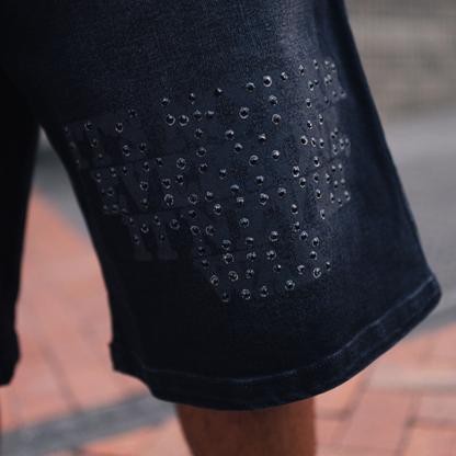 "IT'S NOT FOR EVERYONE" JORTS WASHED BLACK — TONO A TONO